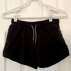 Athleta girl black shorts
Size 10/12